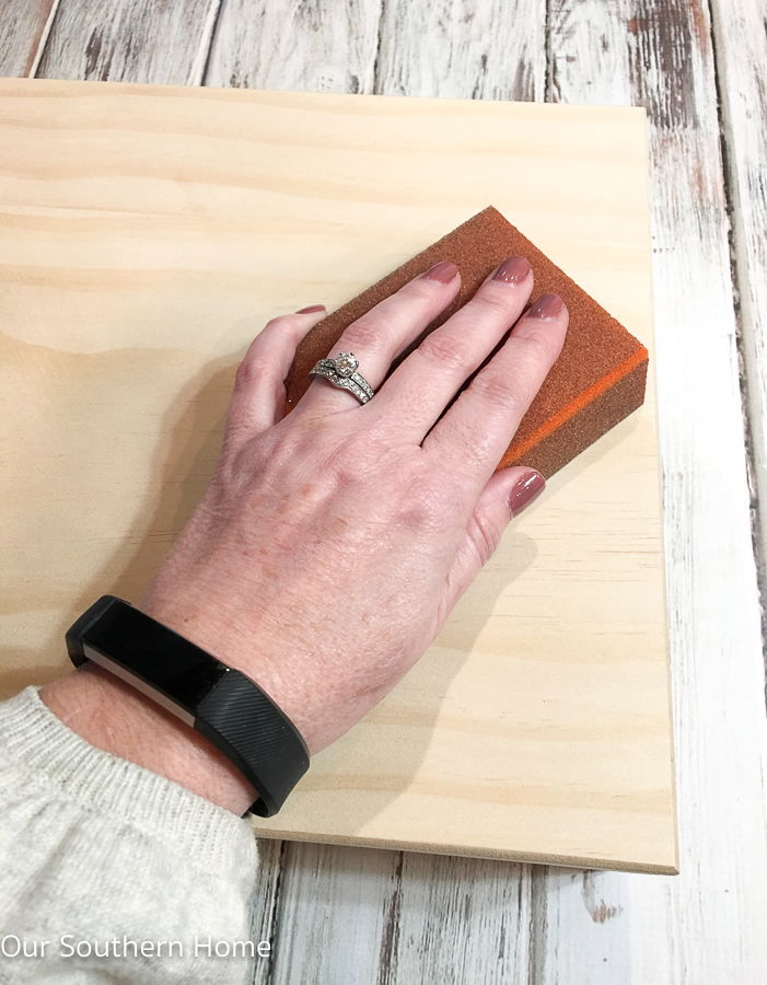 DIY stenciled essential oils storage box is a simple spruce up to unfinished storage.