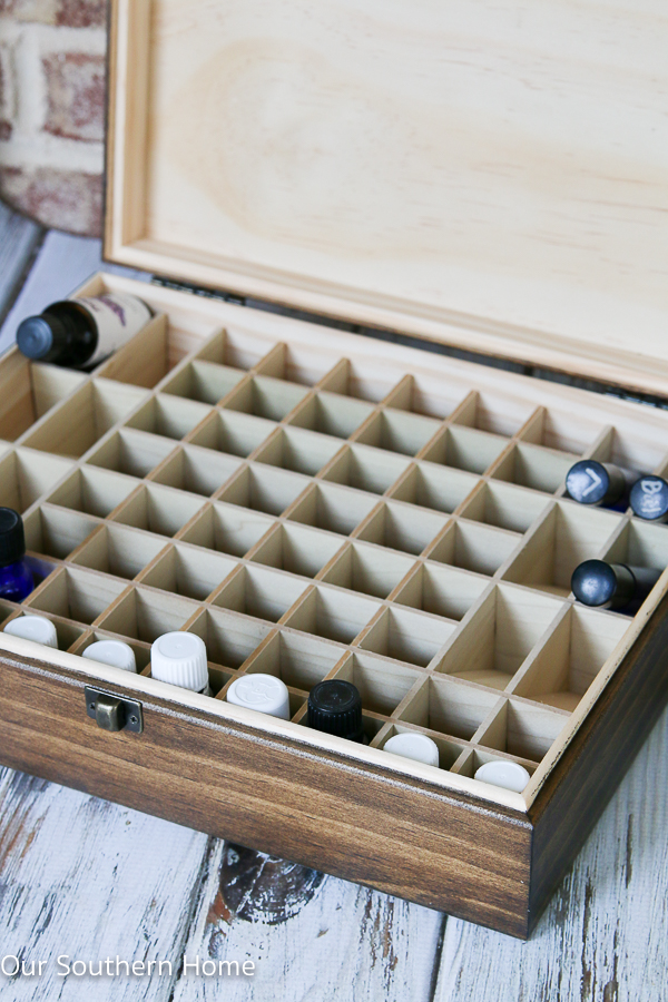 DIY stenciled essential oils storage box is a simple spruce up to unfinished storage.