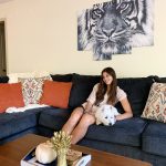 living room with girl and dog