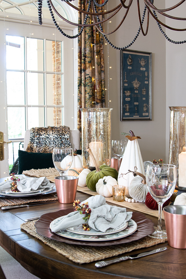 fall dining room with faux pumpkins