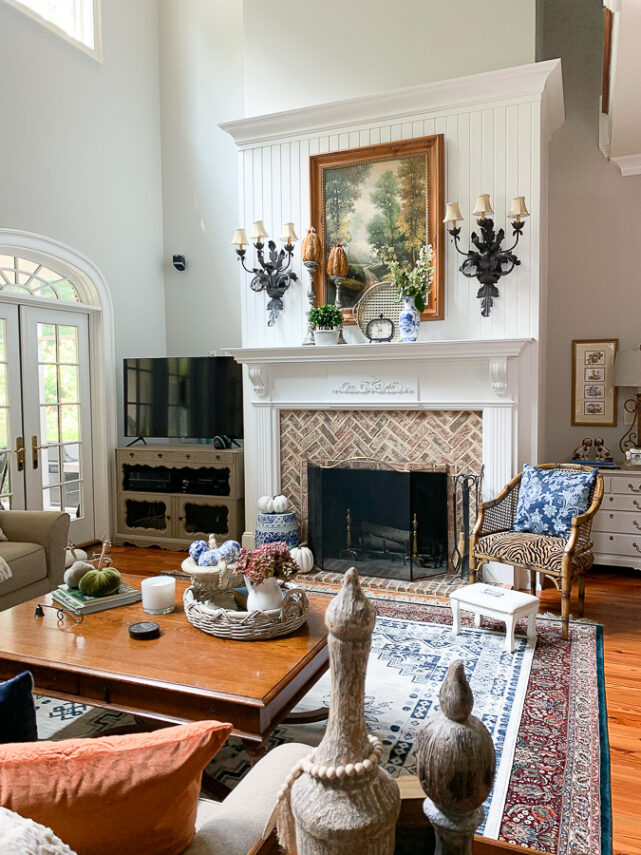 family room with tall fireplace