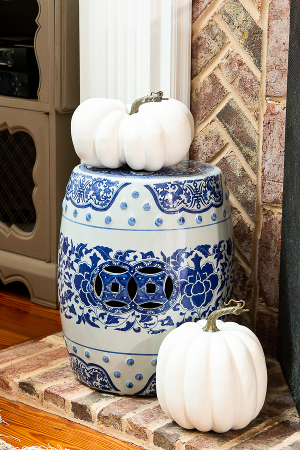 chinoiserie garden stool with pumpkins