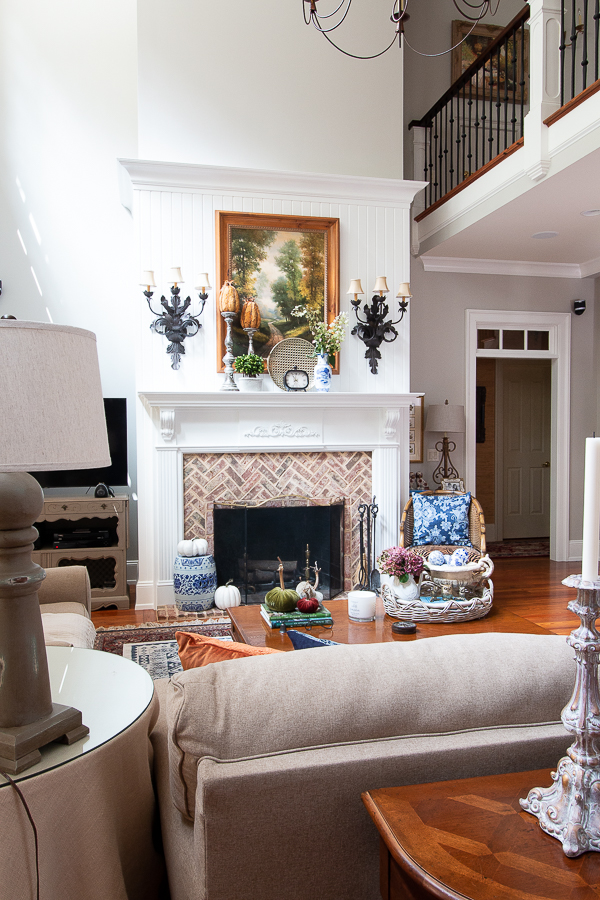 family room with tall fireplace