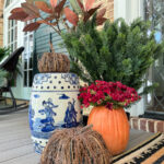 faux pumpkins on porch