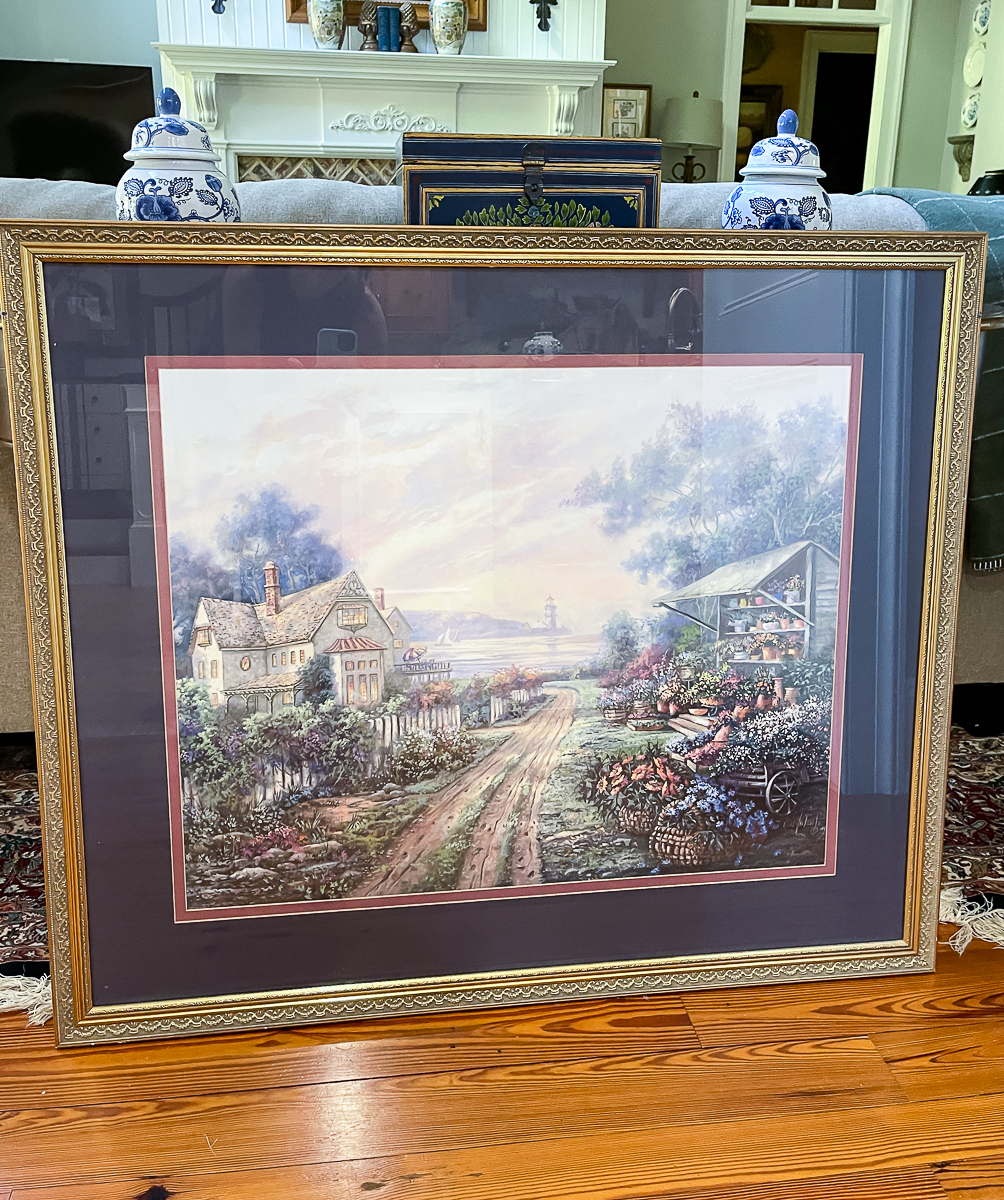 artwork in gold frame