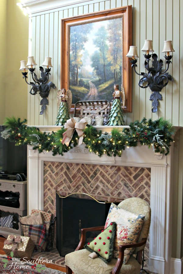 French Country Christmas mantel featuring large PEACE letters and gorgeous metal angels by Our Southern Home