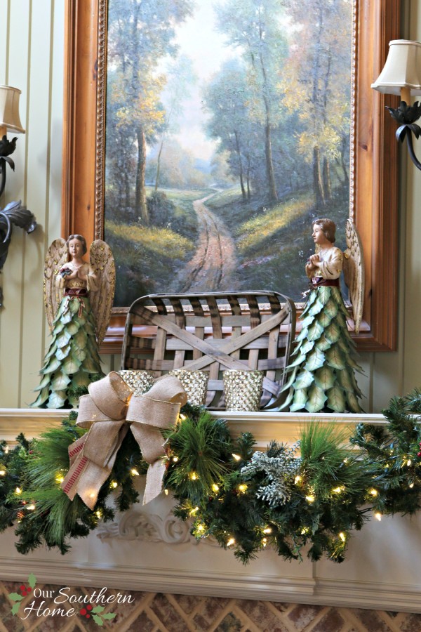 French Country Christmas mantel featuring large PEACE letters and gorgeous metal angels by Our Southern Home