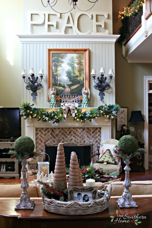 French Country Christmas mantel featuring large PEACE letters and gorgeous metal angels by Our Southern Home