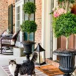 front porch with topiaries