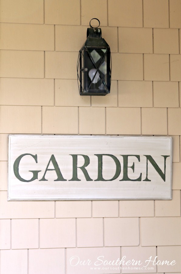 Hand-painted garden sign tutorial with a thrift store sign by Our Southern Home