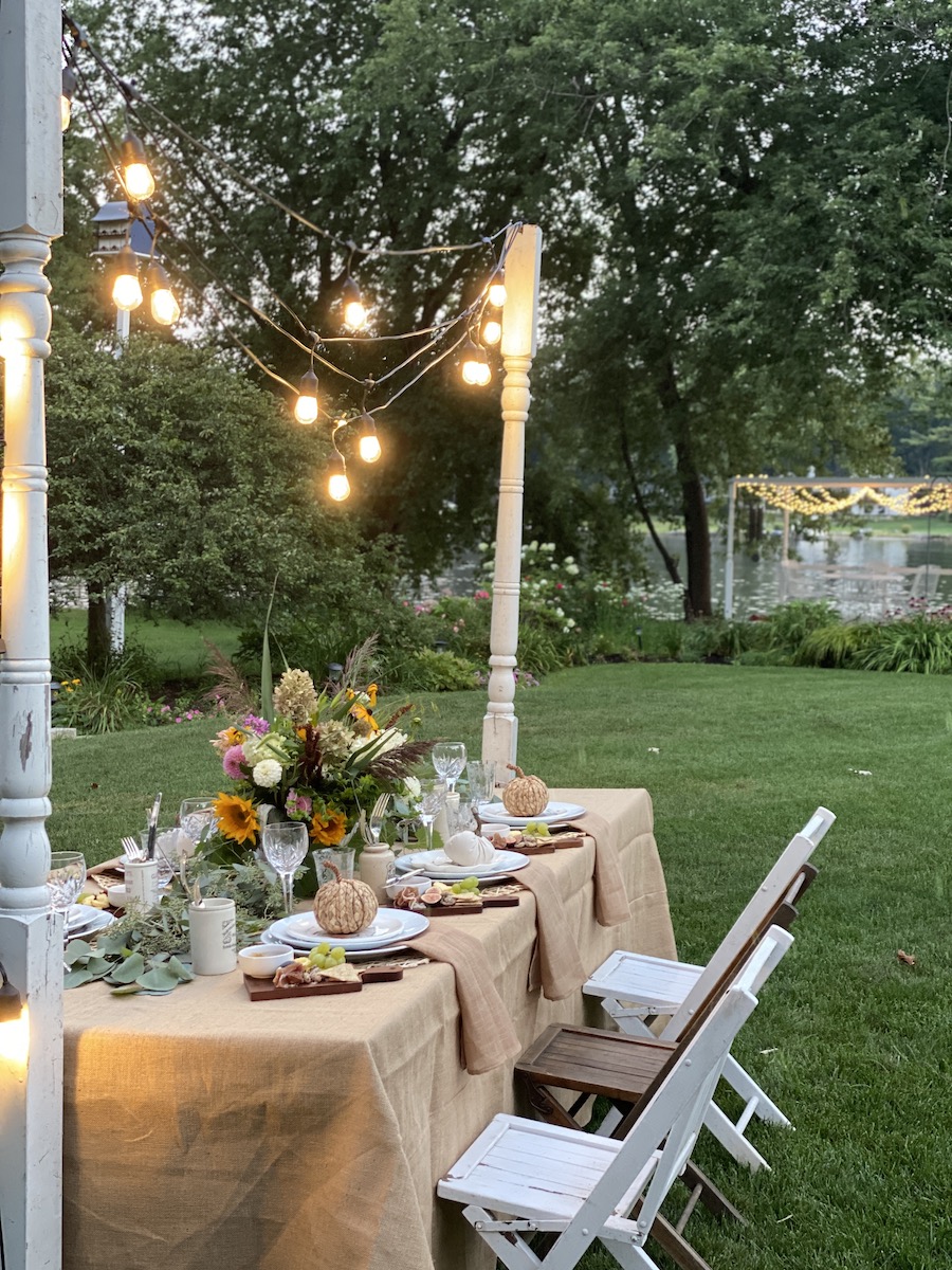 outdoor dining with string lights