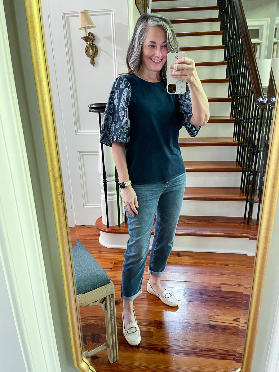 mirror selfie in jeans and tee