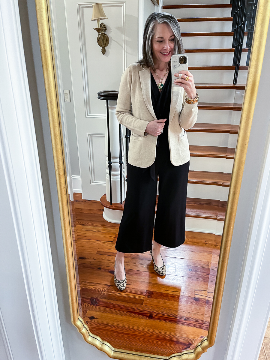 mirror selfie in black jumpuit and blazer