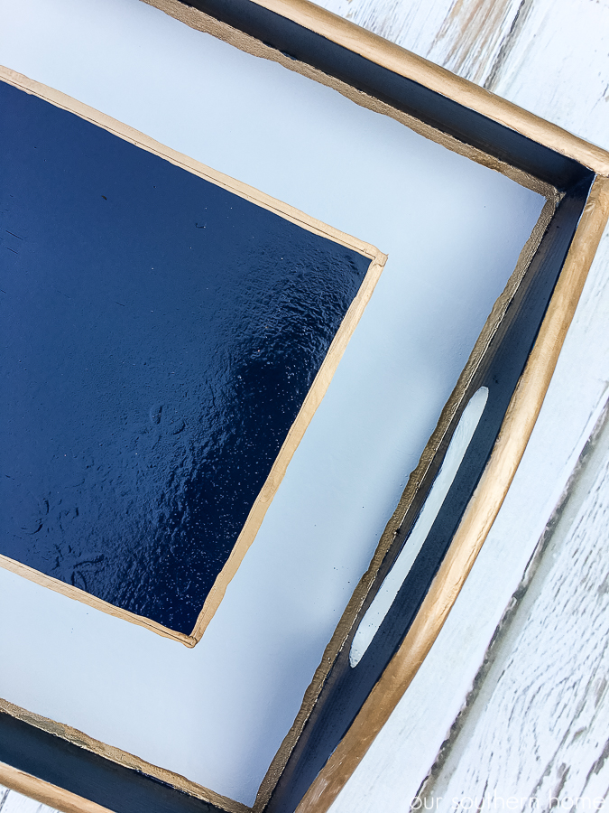 Thrift store tray makeover with a masculine look for a college apartment. #thriftstore #makeover #tray #apartmentdecor #college