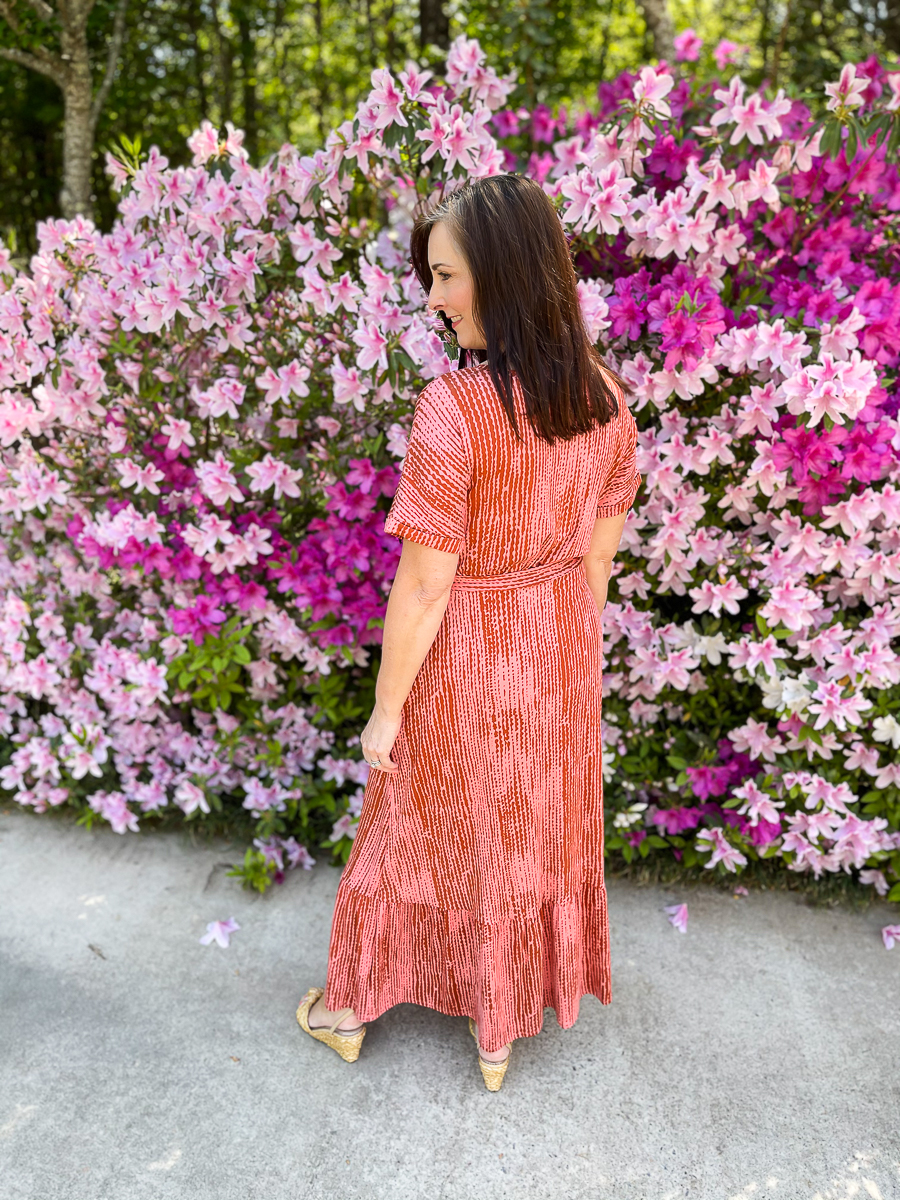woman in long coral dress for summer