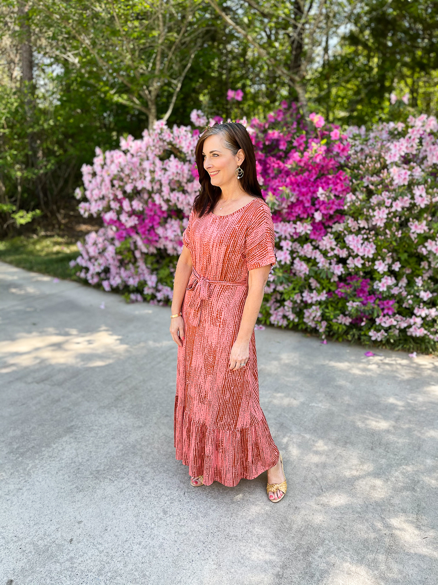 woman in long coral dress for summer