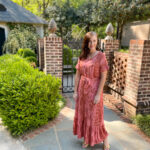 woman in long coral dress for summer