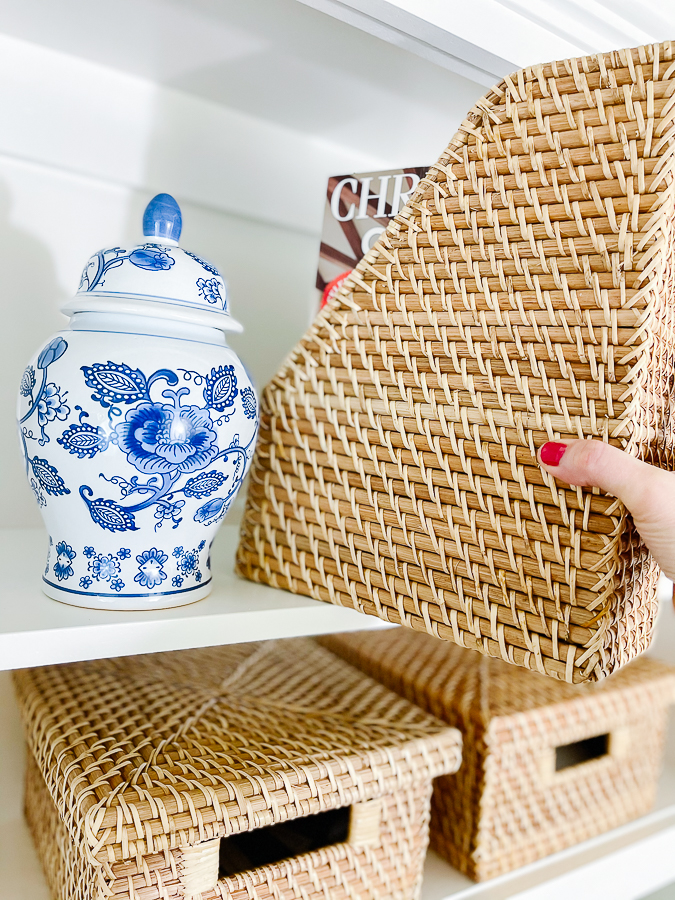 blue and white vase with magazine organizer