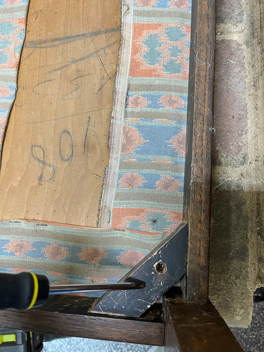 removing screws from underside of stool