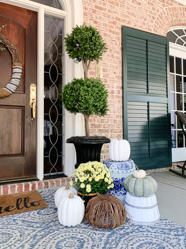 painted apple basket with fall decor