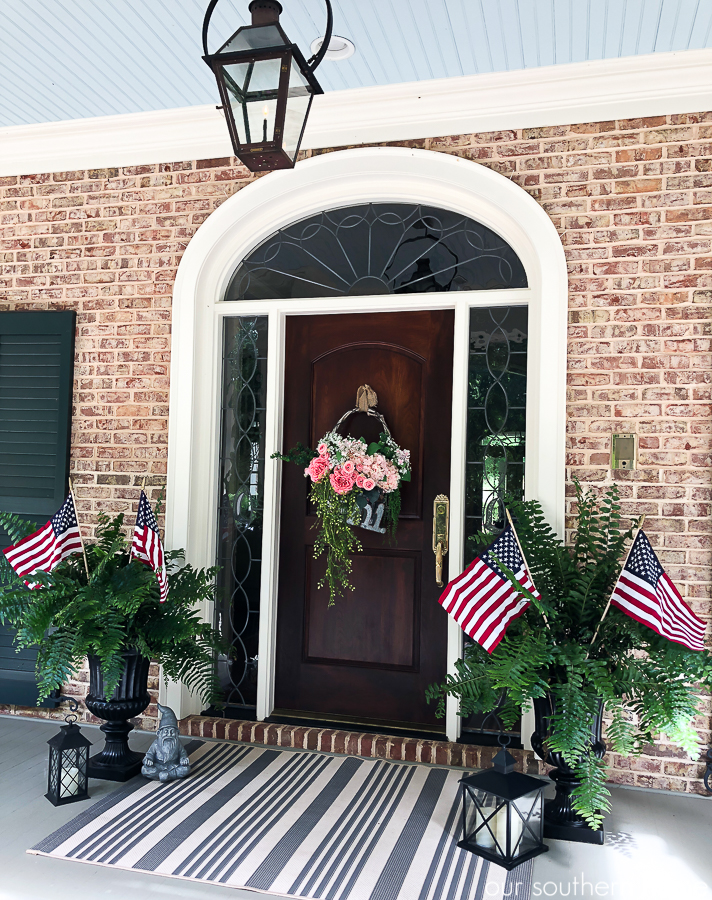 Southern Patriotic Porch with simple ideas to show your pride! #porch #patrioticporch #southernporch #patrioticdecor #patrioticideas #4thofjuly #laborday #memorialday