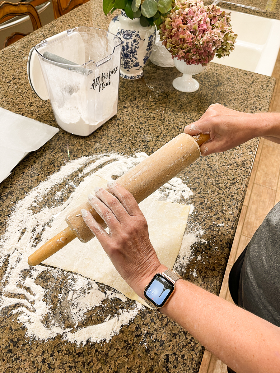 woman rolling dough