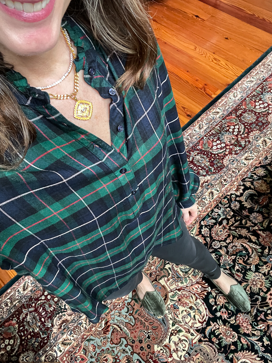 woman in plaid tunic