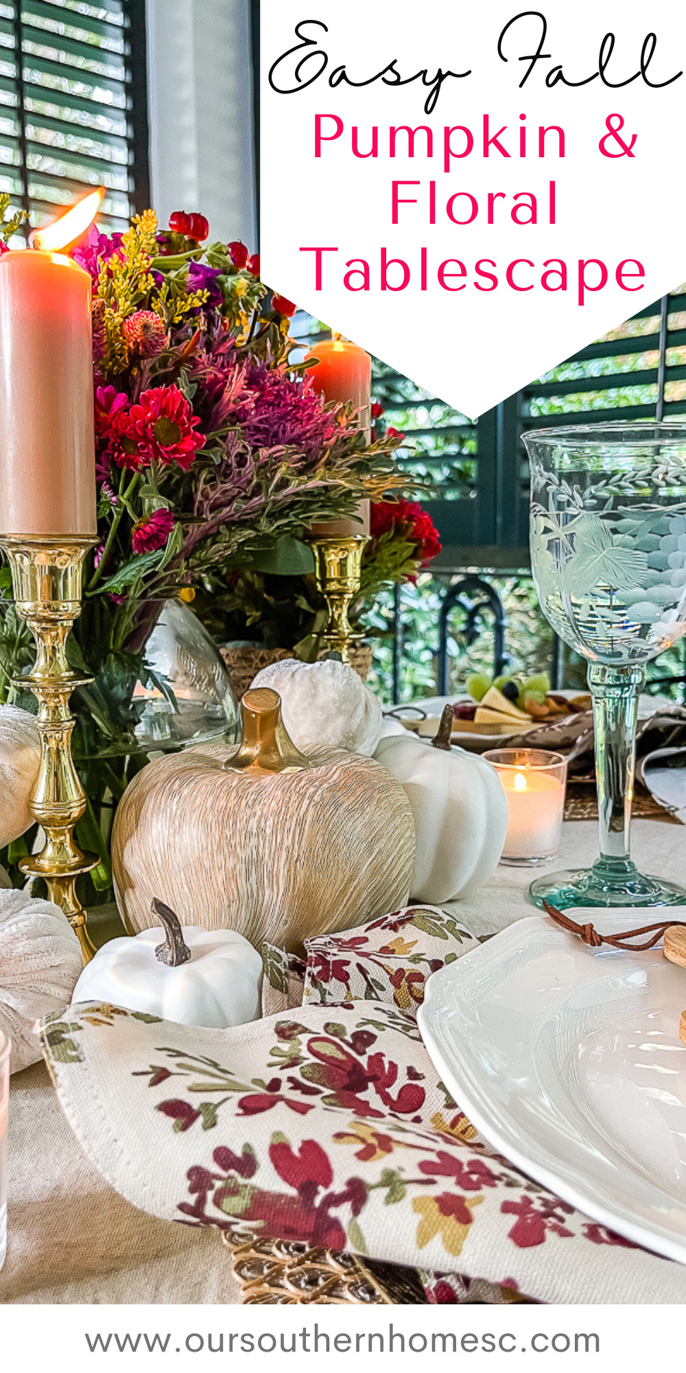 table set with flowers and pumpkins