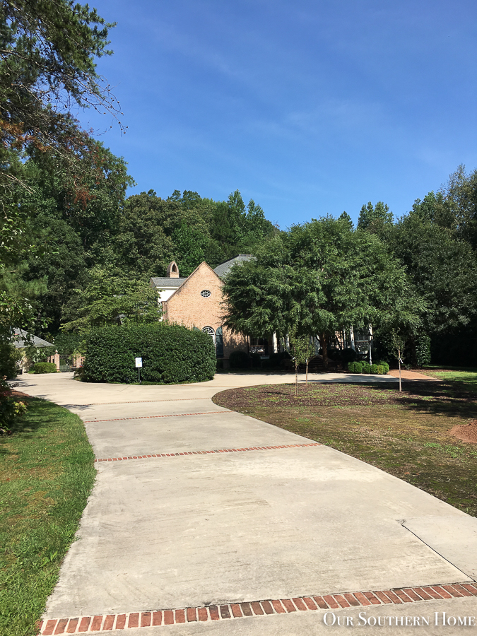 driveway with brick house