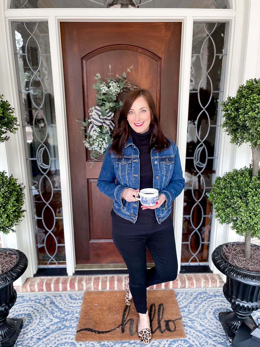 woman standing at front door