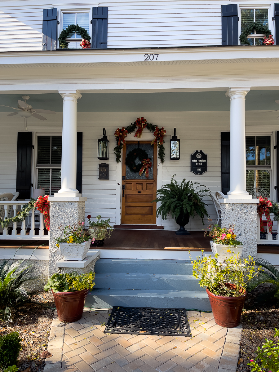 white house with a stained door