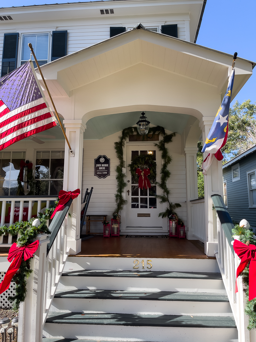 front porch decorated with Christmas decor