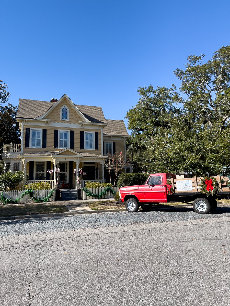 house with red truck