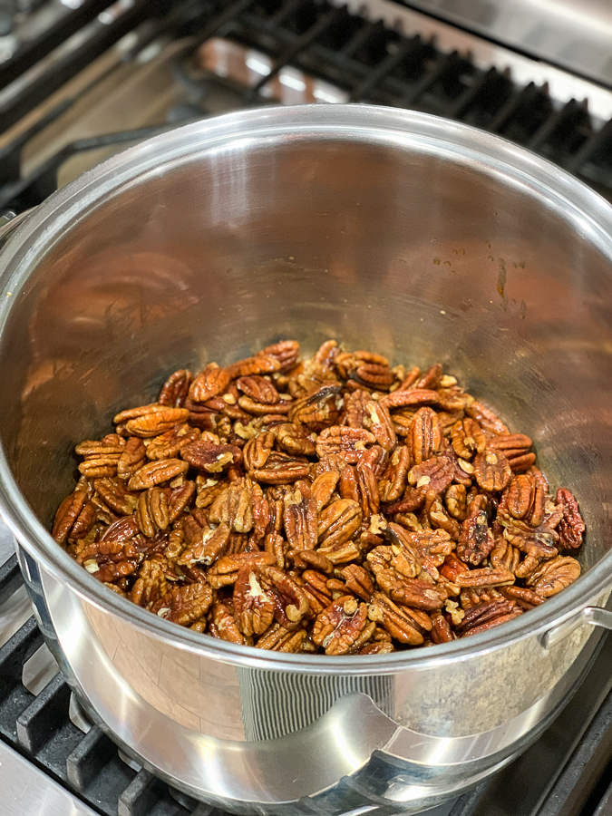 pecans on the stove in a pot