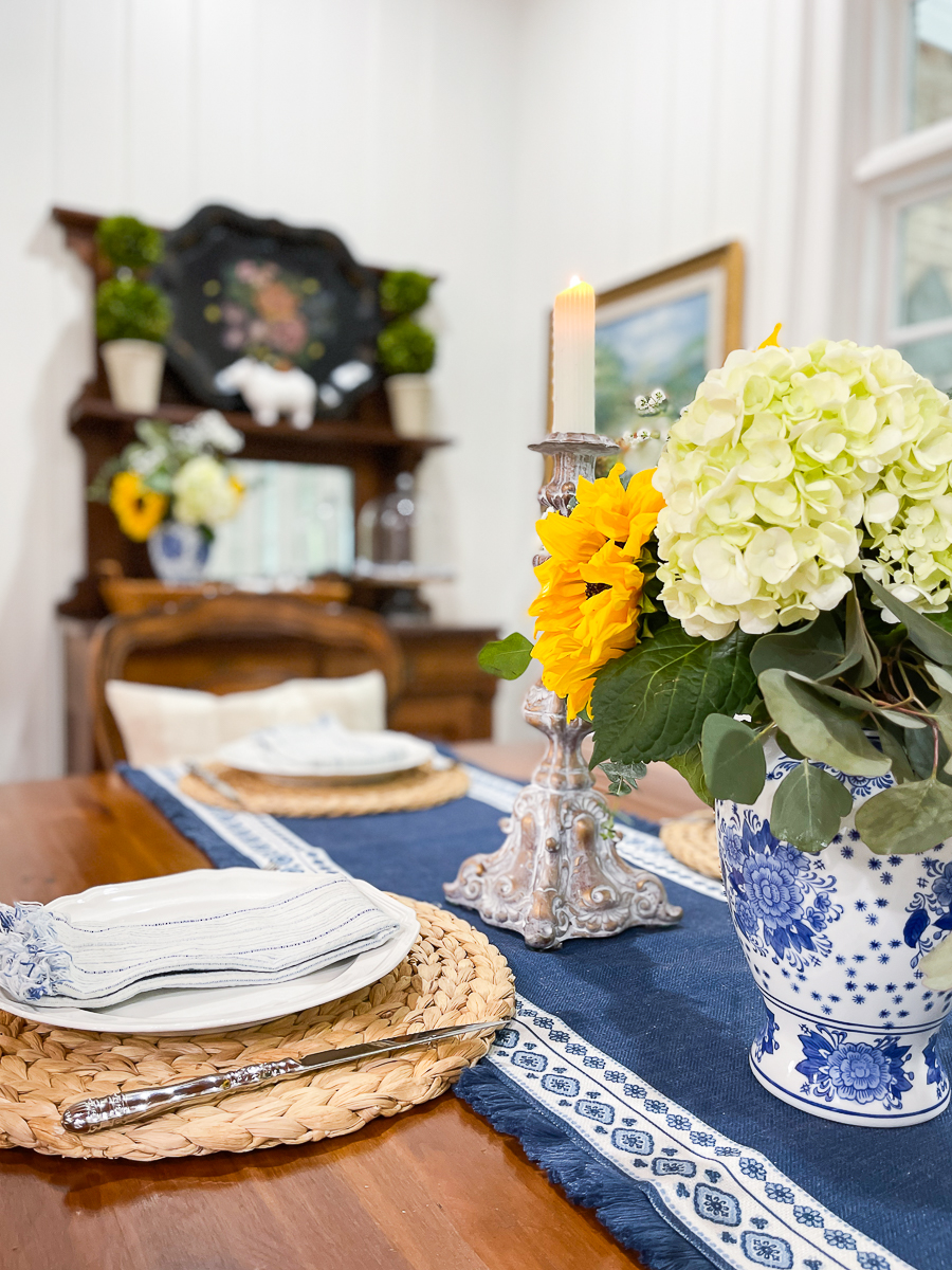 sunflowers in blue vase