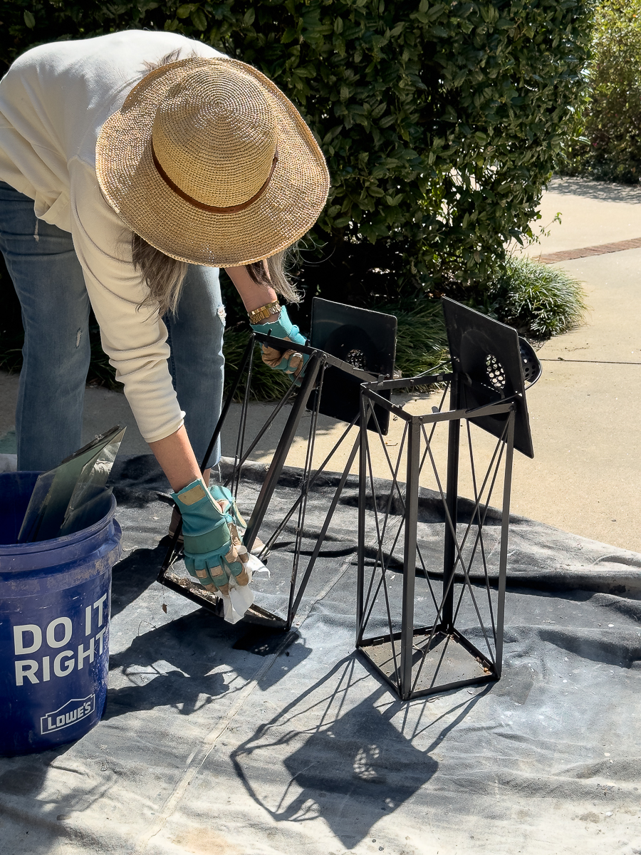 cleaning lanterns with towel