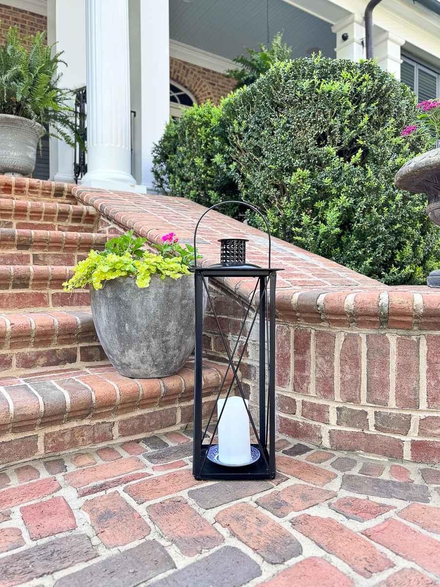 lantern by flowers