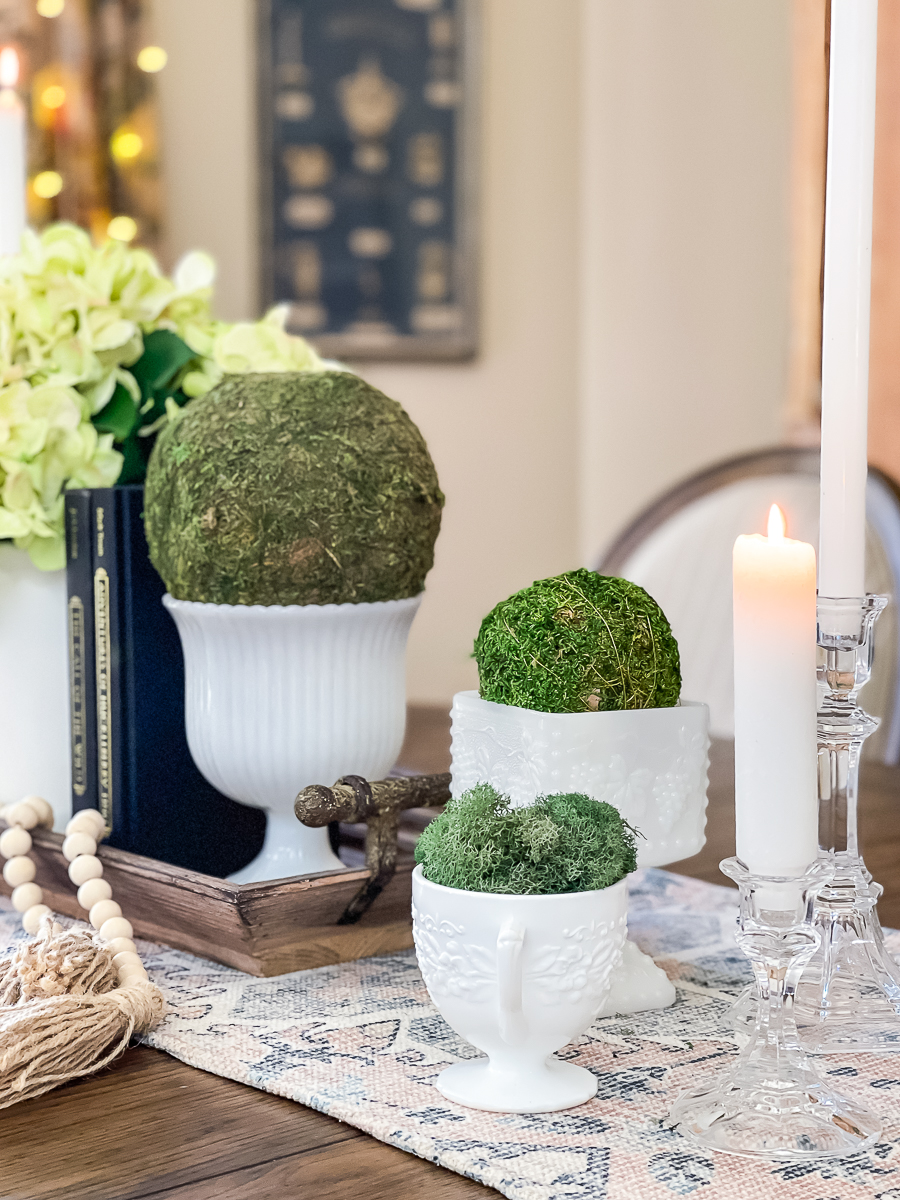 compotes with moss balls on a table