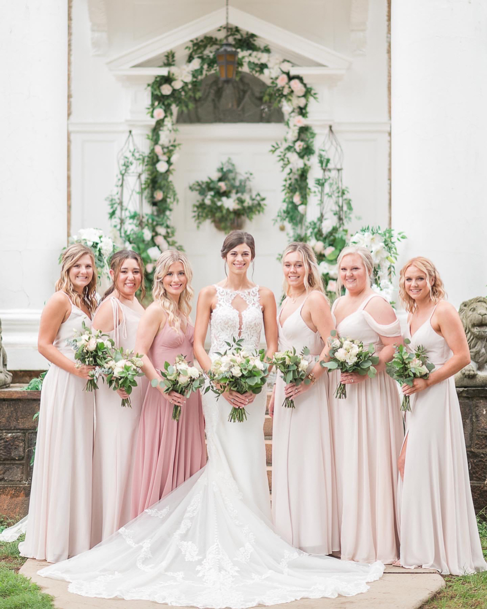 bride with her bridesmaids