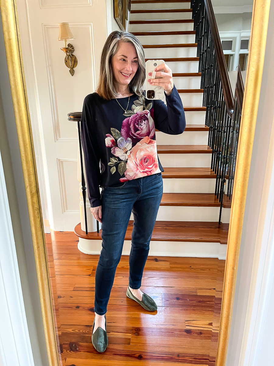 mirror selfie with jeans and floral tee