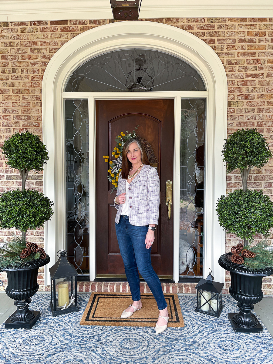 lady on porch with tween jacket