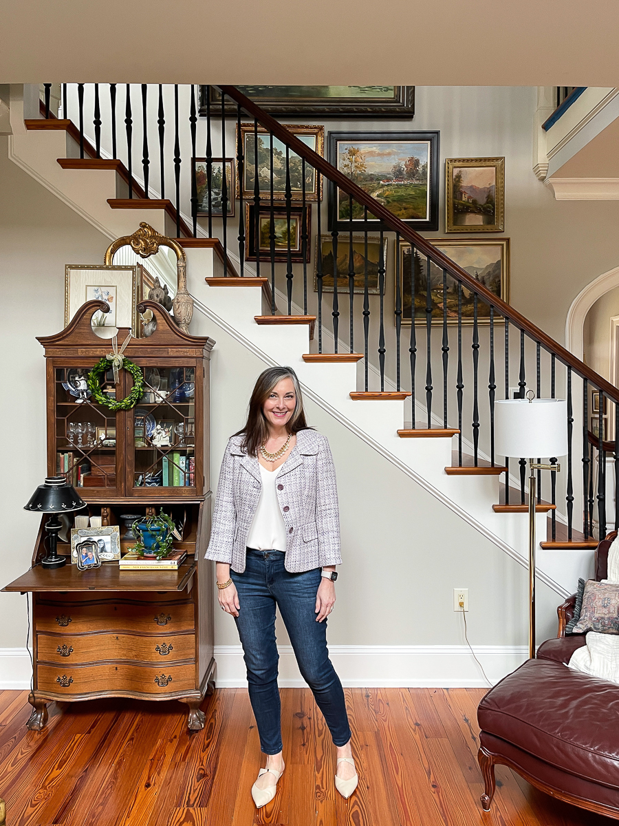 woman in family room with gallery wall