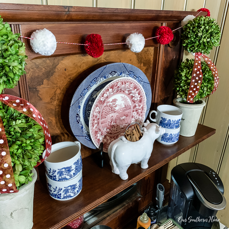 Details for creating a Valentine's Day beverage bar with adorable pom pom garland.