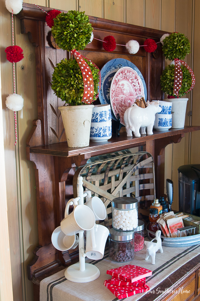 Details for creating a Valentine's Day beverage bar with adorable pom pom garland.