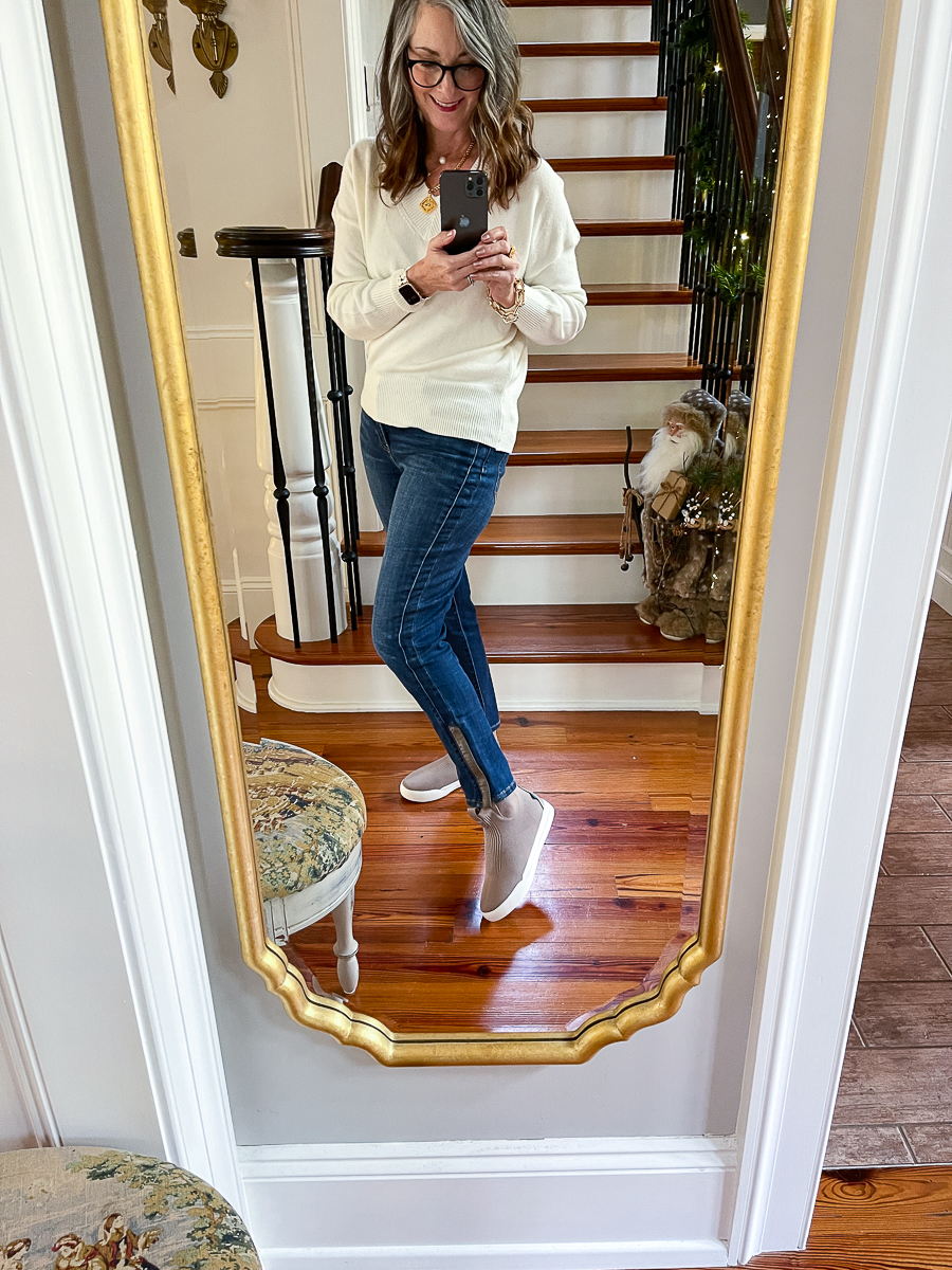 christy in the mirror showing boots