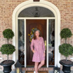 woman on porch in dress