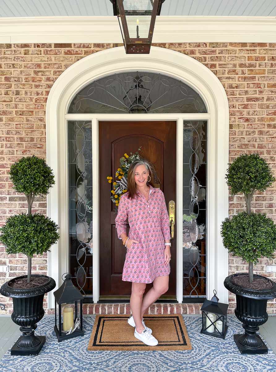 woman on porch in dress