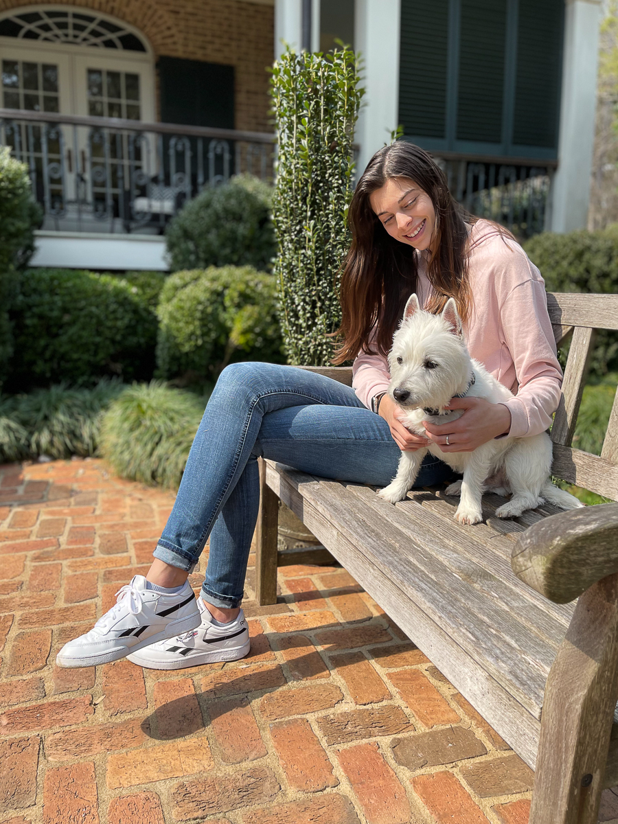 dog and girl on bench