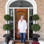 woman on porch in casual outfit