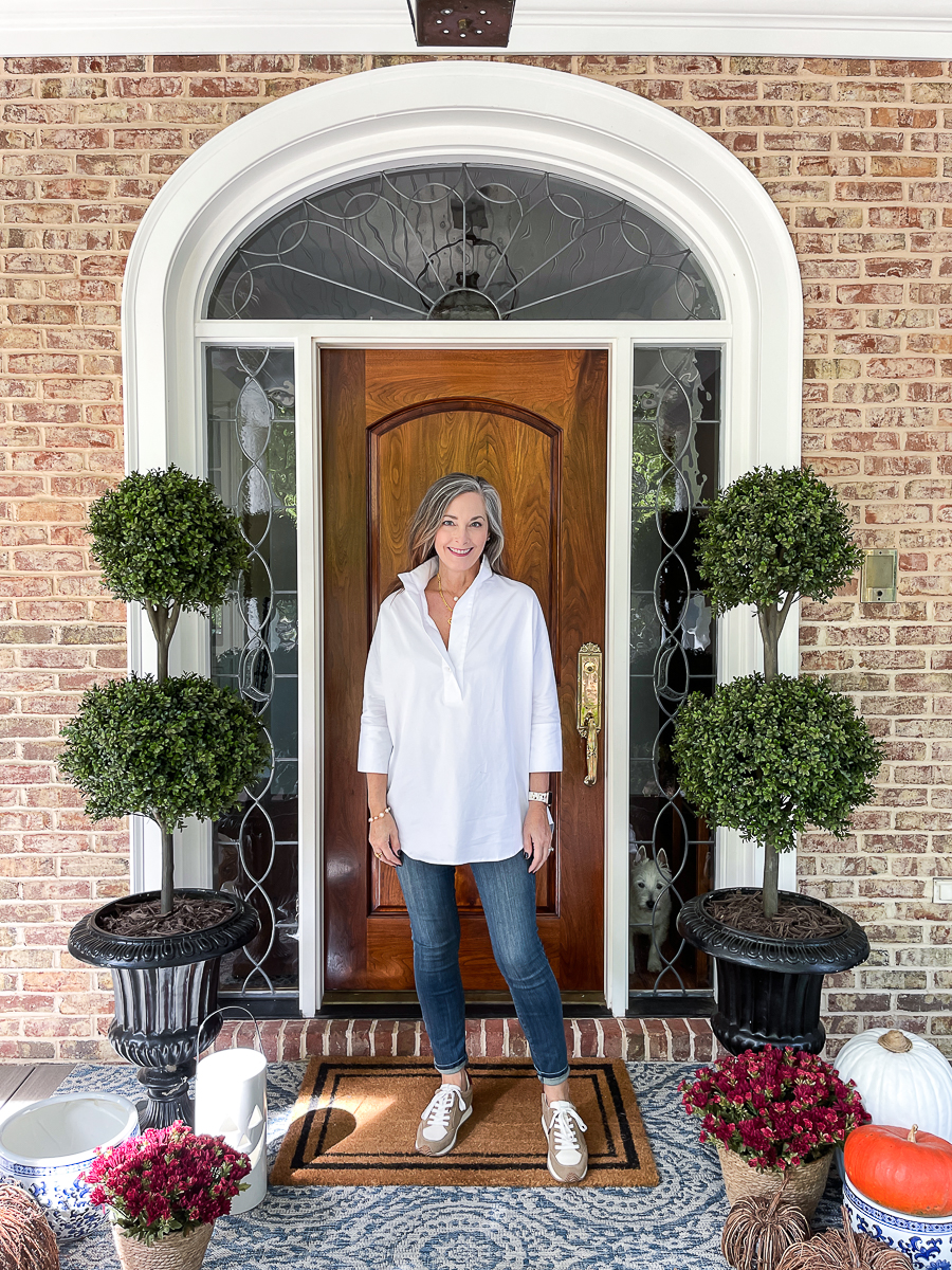 white tunic and jeans